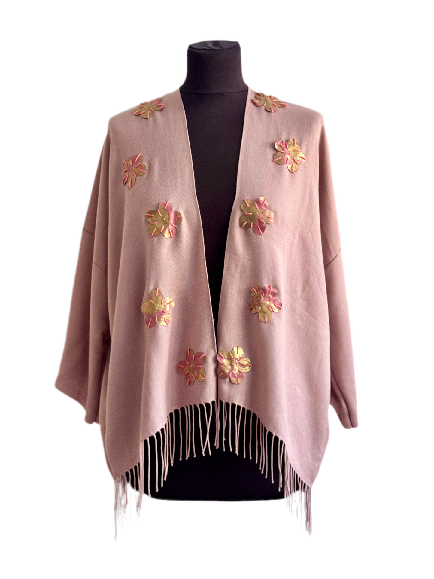 The desi jacket Upcycled & handmade from textile waste is a one size fits most easy to wear style.