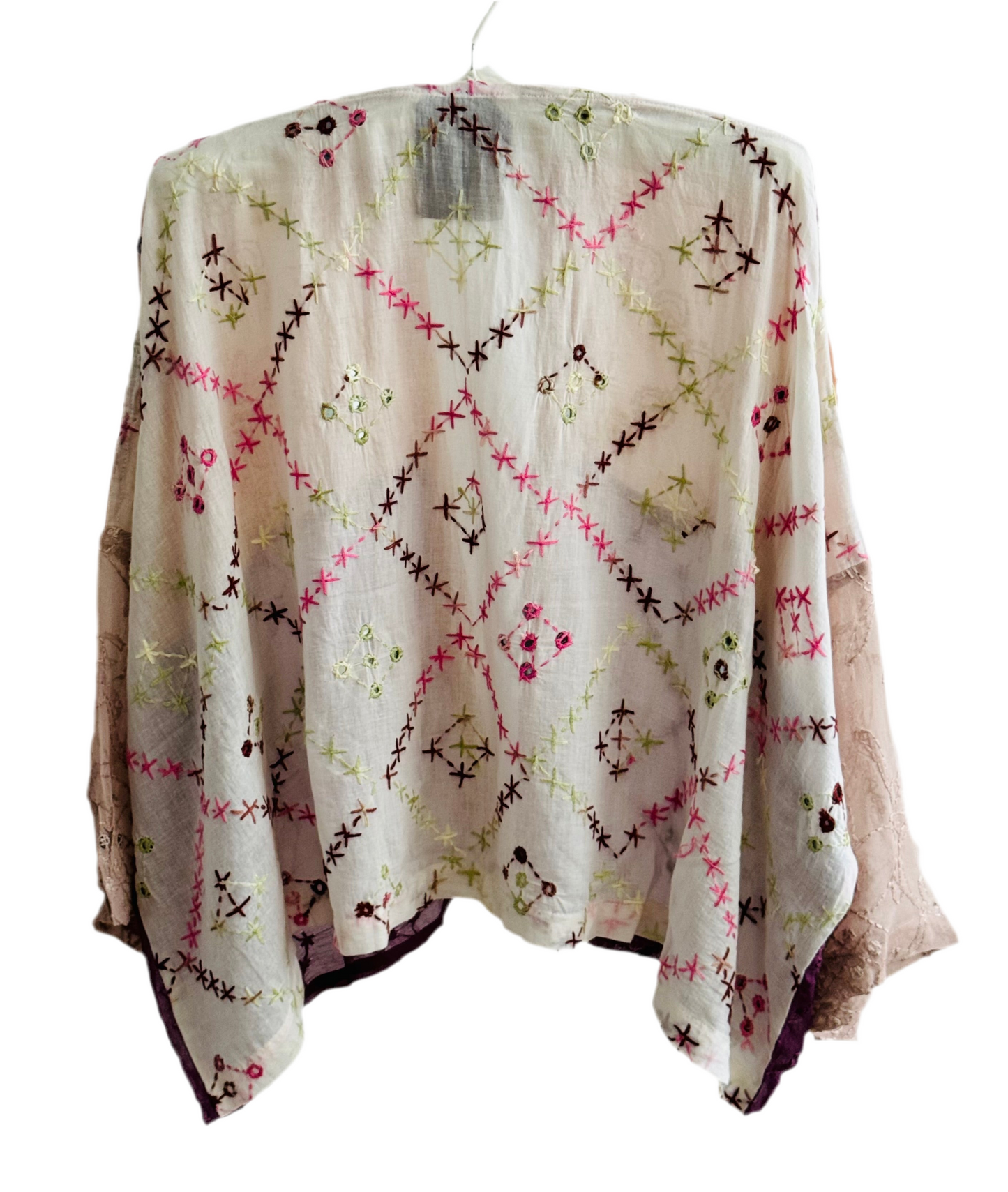 The desi jacket Upcycled & handmade from textile waste is a one size fits most easy to wear style.