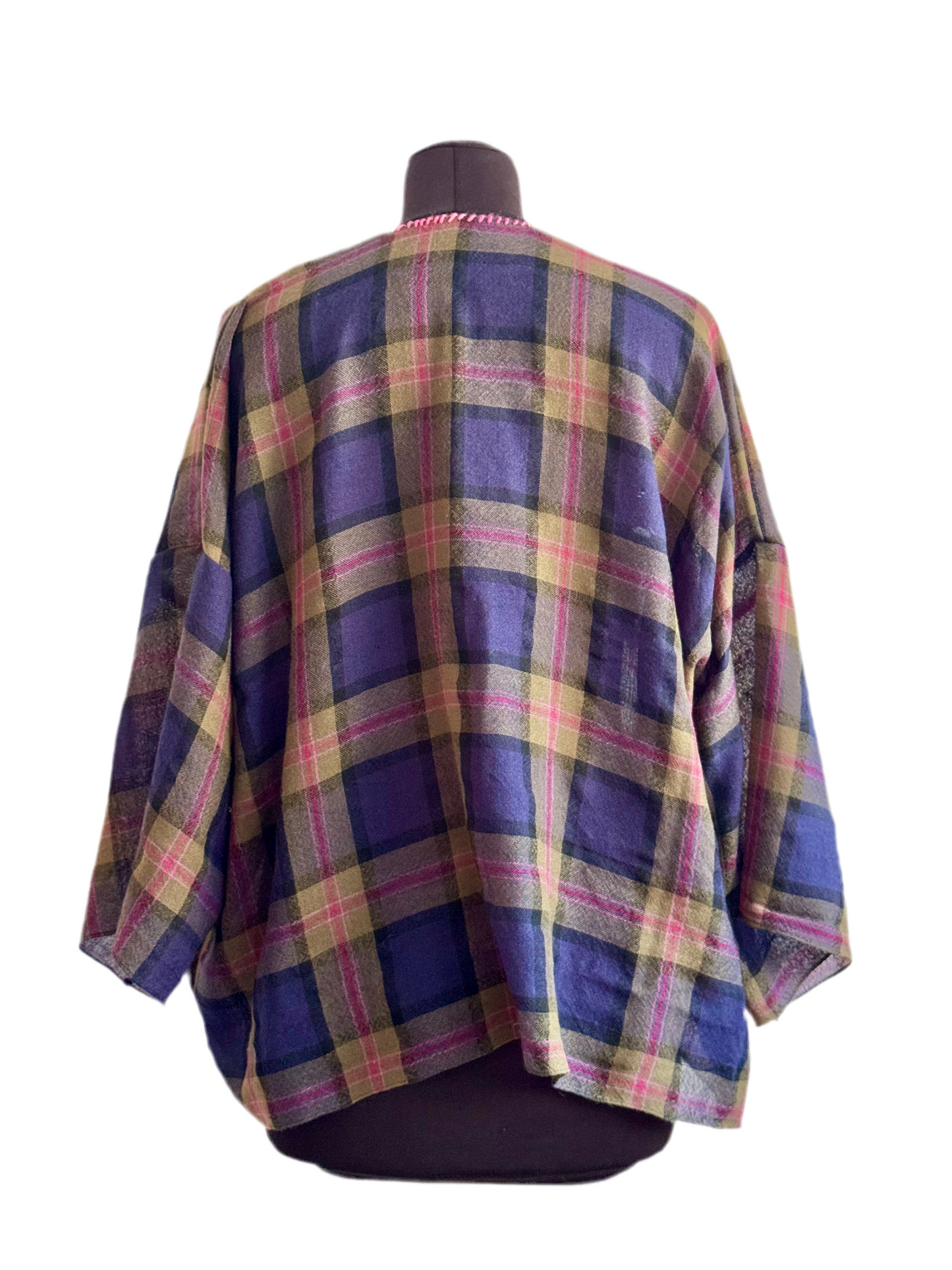 The desi jacket Upcycled & handmade from textile waste is a one size fits most easy to wear style.