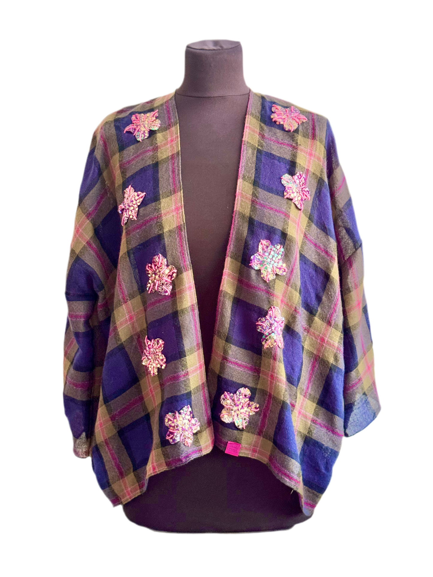 The desi jacket Upcycled & handmade from textile waste is a one size fits most easy to wear style.