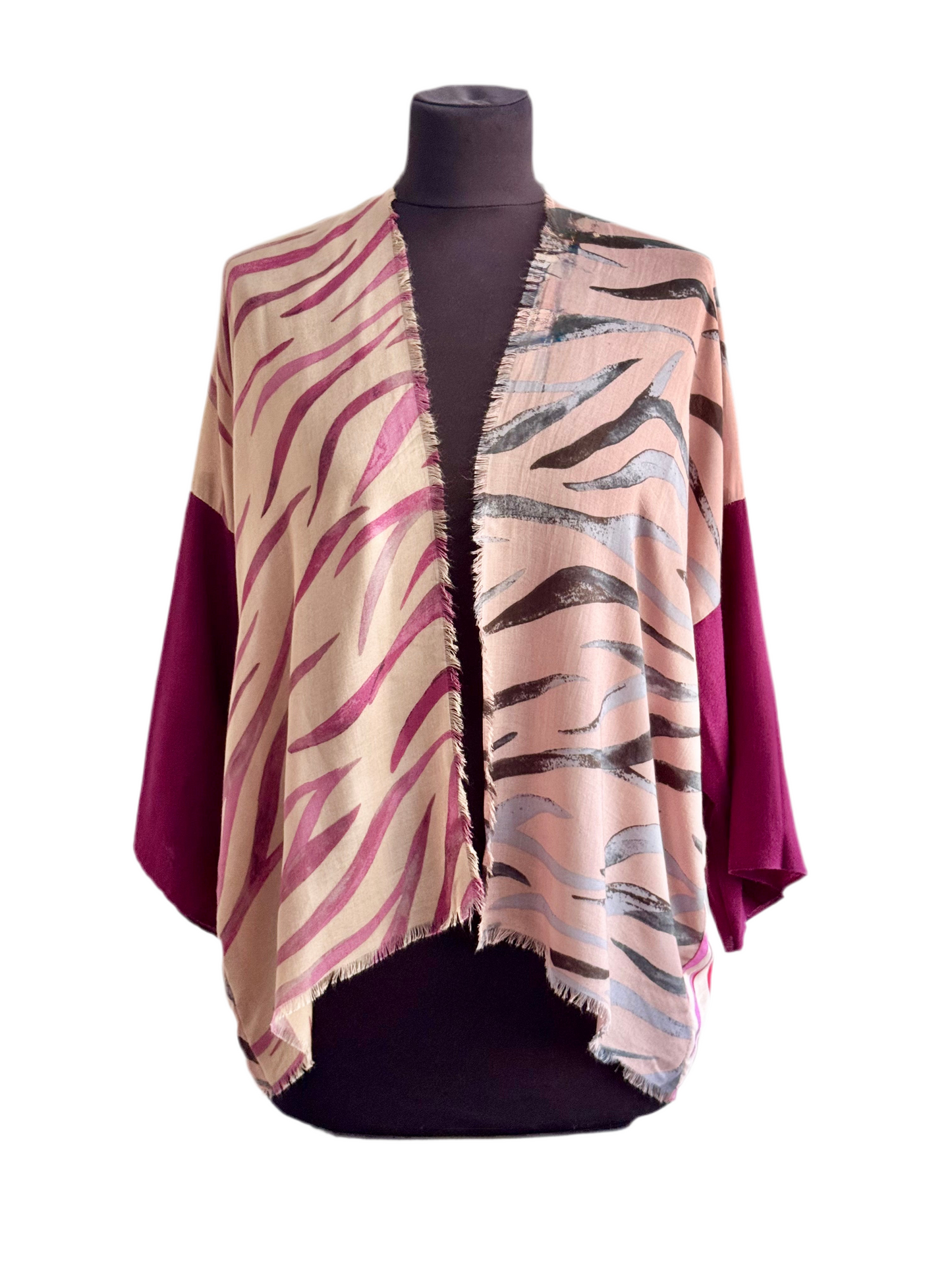 The desi jacket Upcycled & handmade from textile waste is a one size fits most easy to wear style.