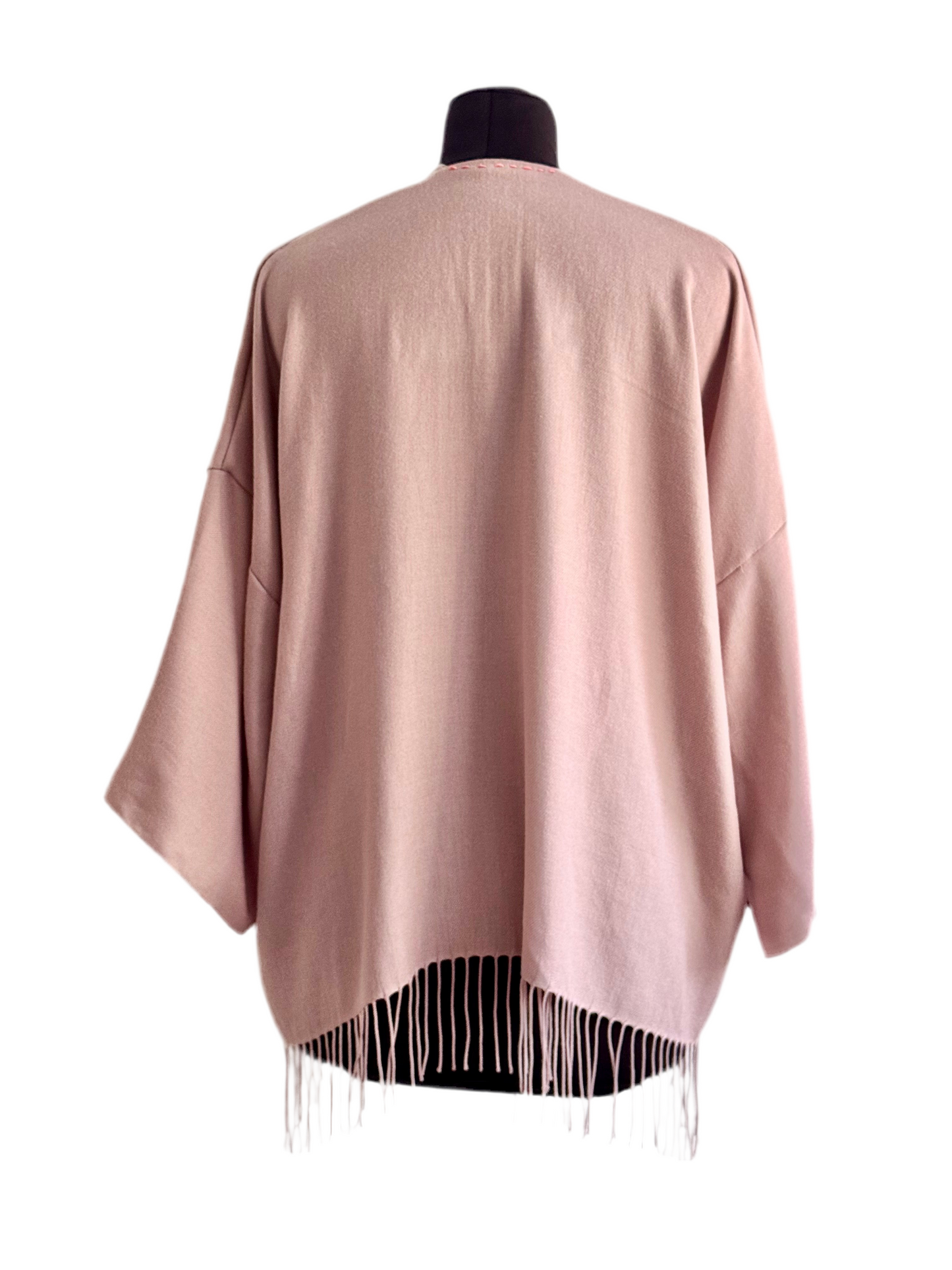 The desi jacket Upcycled & handmade from textile waste is a one size fits most easy to wear style.