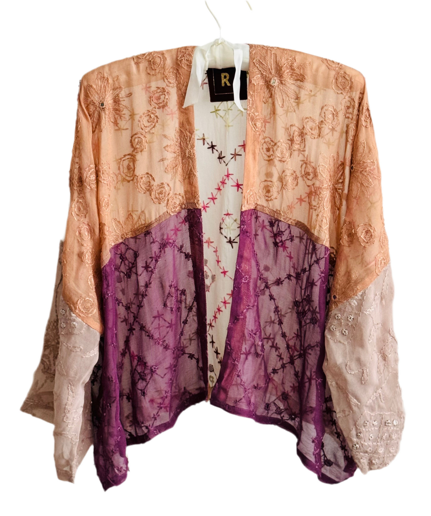 The desi jacket Upcycled & handmade from textile waste is a one size fits most easy to wear style.