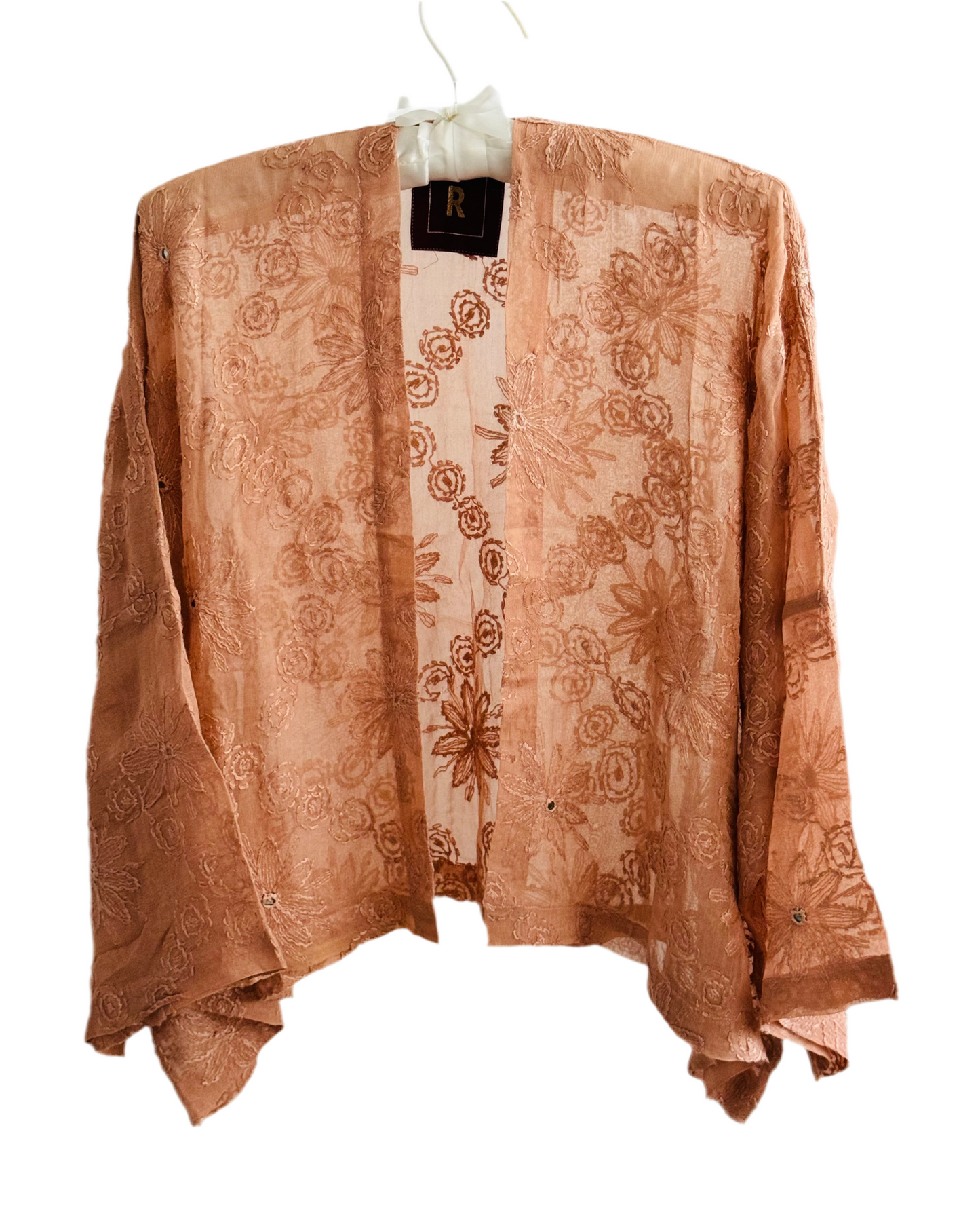 The desi jacket Upcycled & handmade from textile waste is a one size fits most easy to wear style.