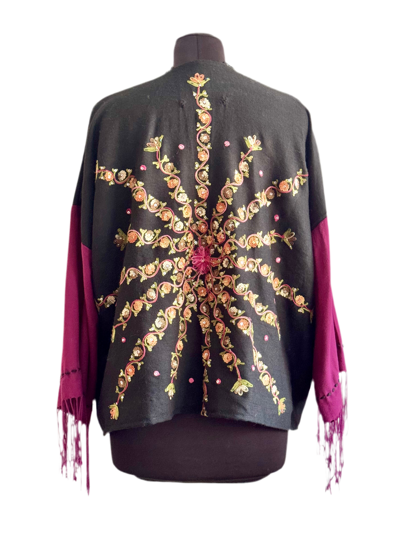 The desi jacket Upcycled & handmade from textile waste is a one size fits most easy to wear style.