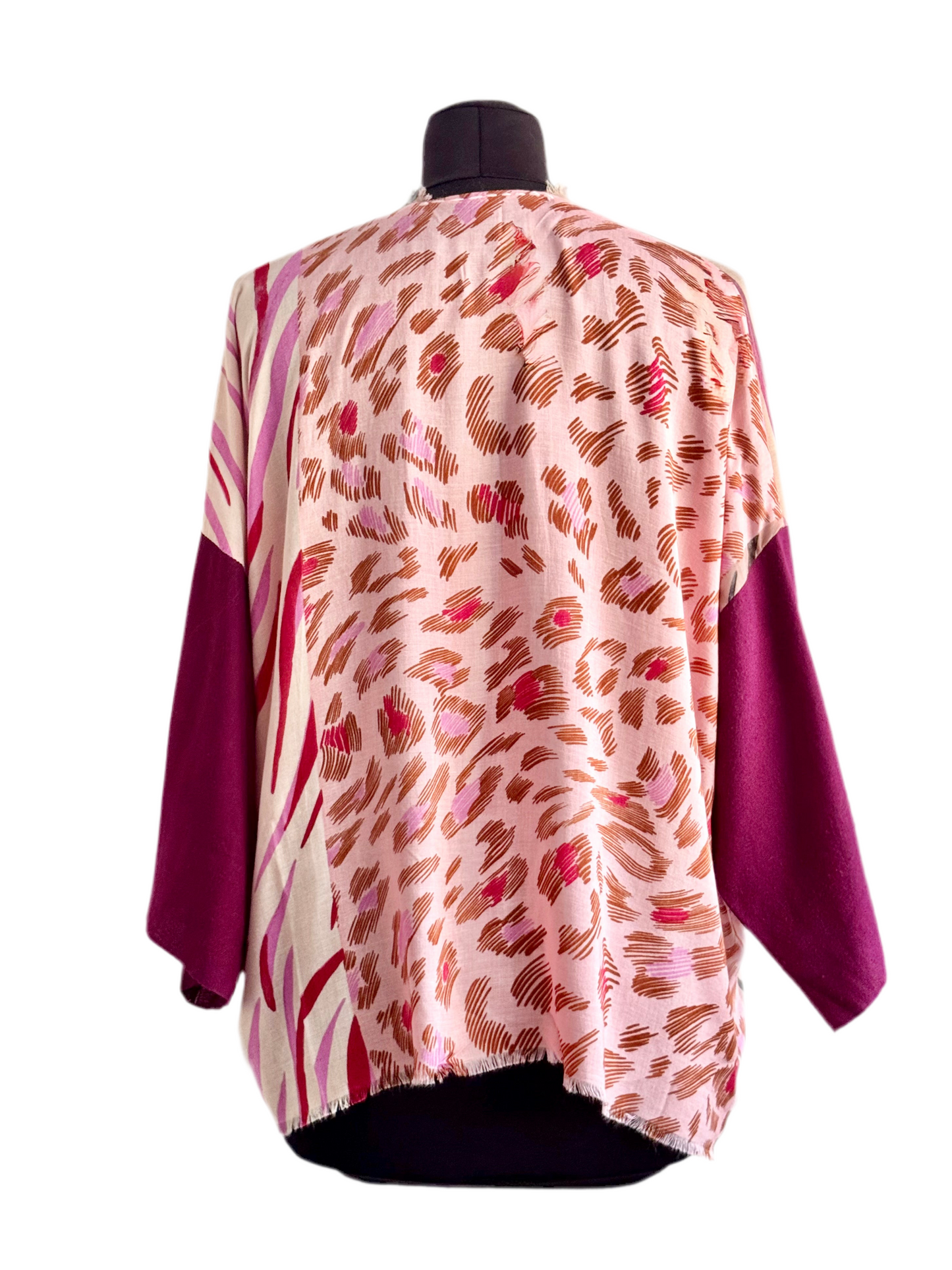 The desi jacket Upcycled & handmade from textile waste is a one size fits most easy to wear style.