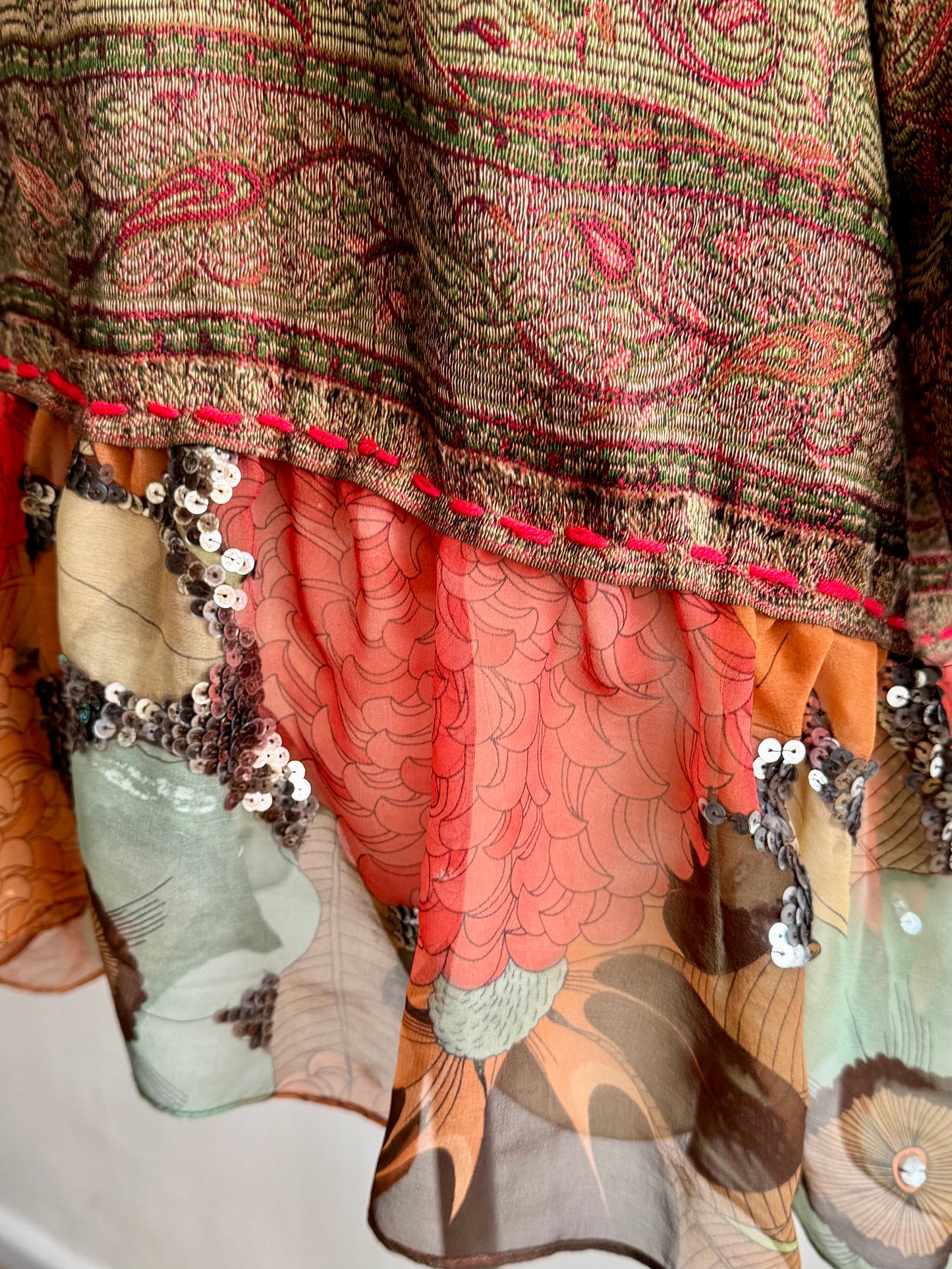 The desi jacket Upcycled & handmade from textile waste is a one size fits most easy to wear style.