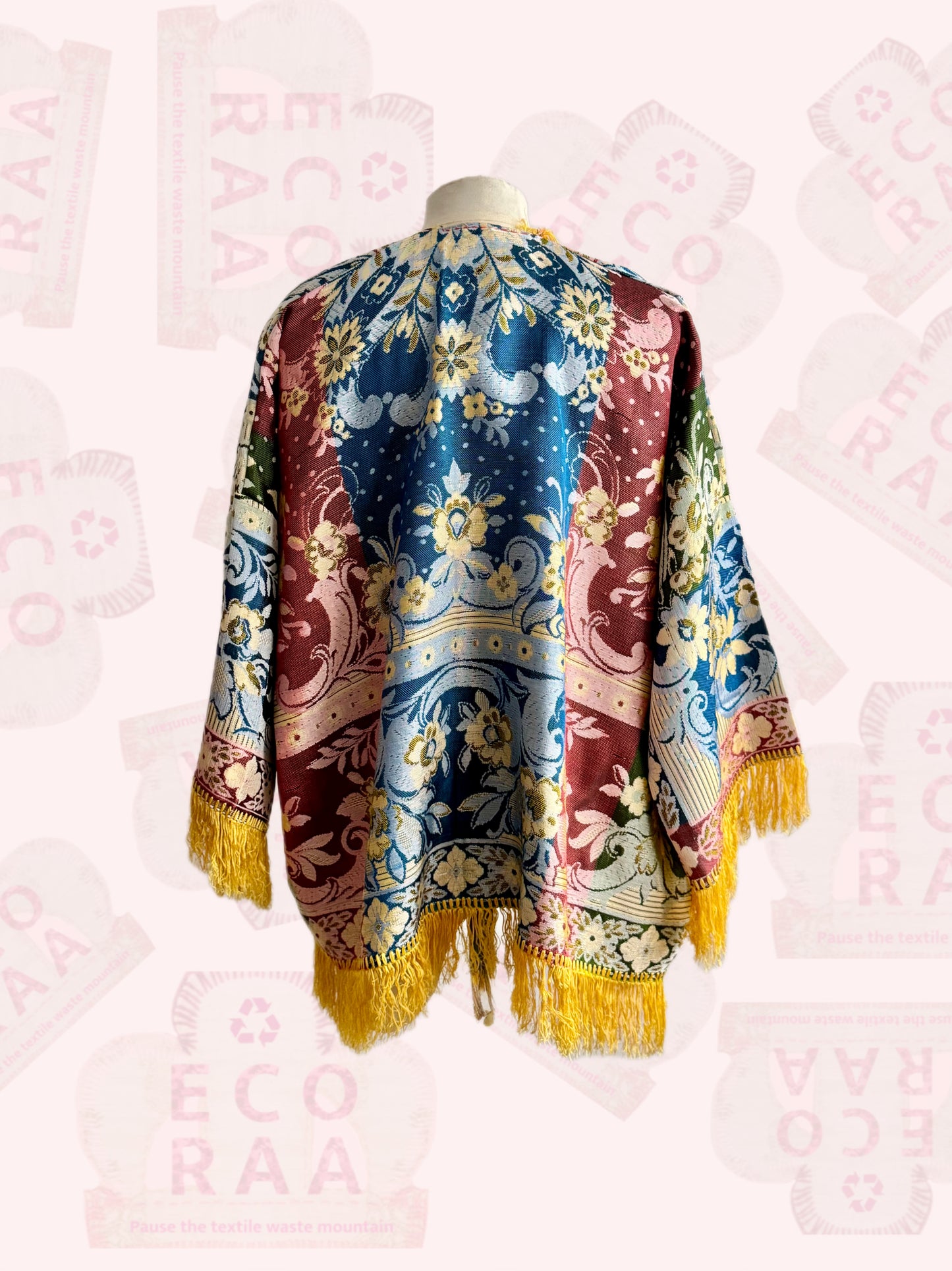 The desi jacket Upcycled & handmade from textile waste is a one size fits most easy to wear style.