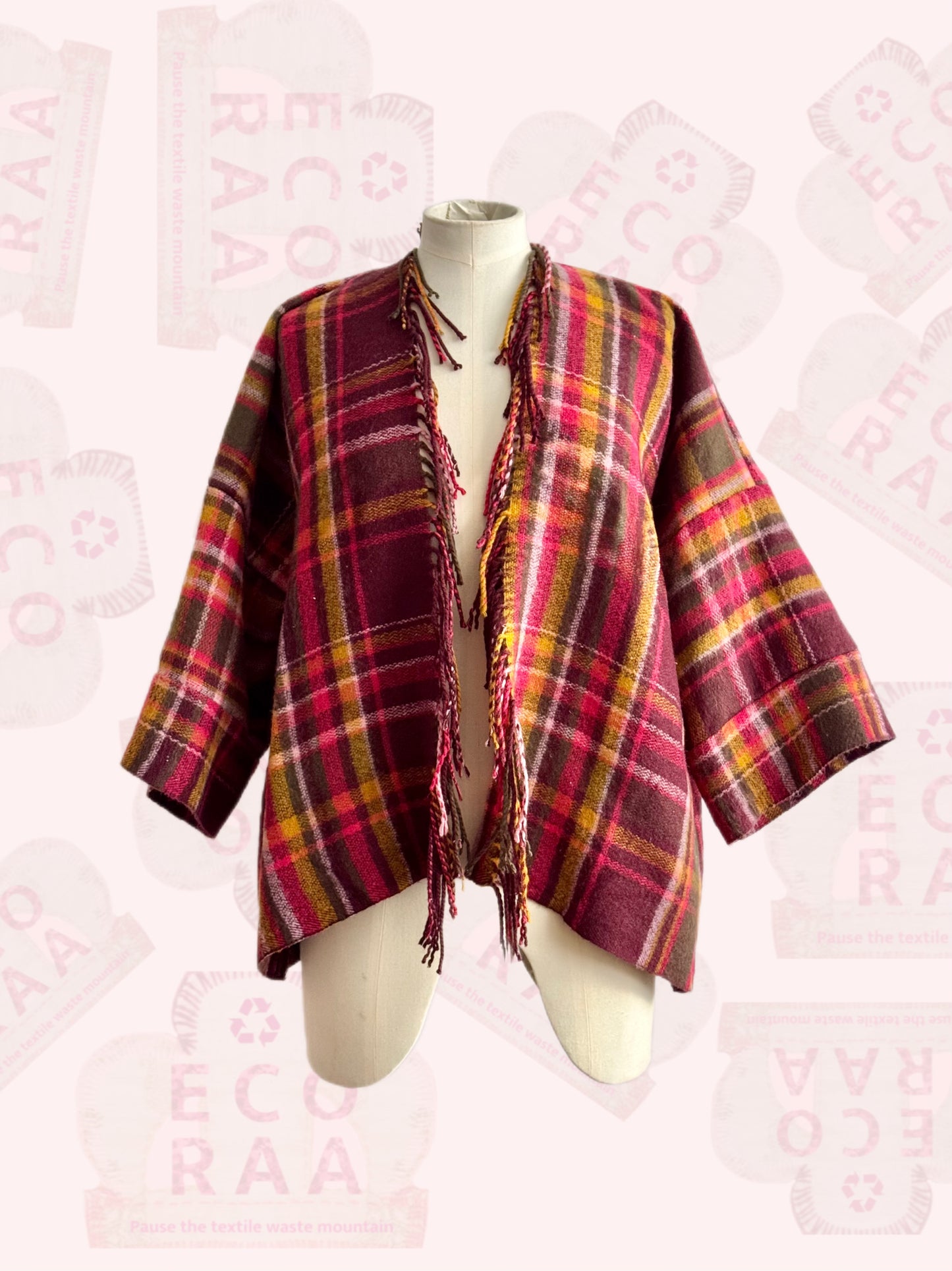 The desi jacket Upcycled & handmade from textile waste is a one size fits most easy to wear style.