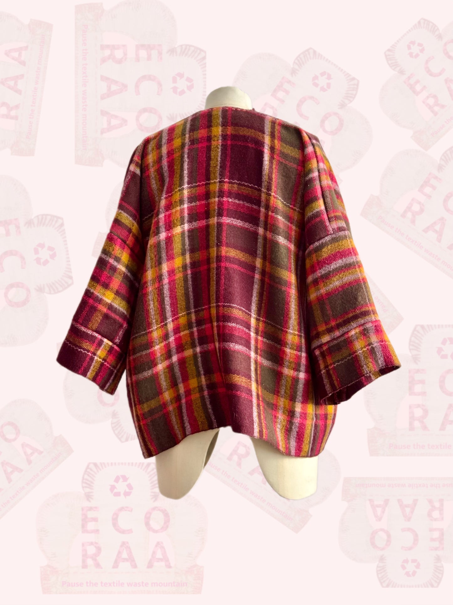 The desi jacket Upcycled & handmade from textile waste is a one size fits most easy to wear style.