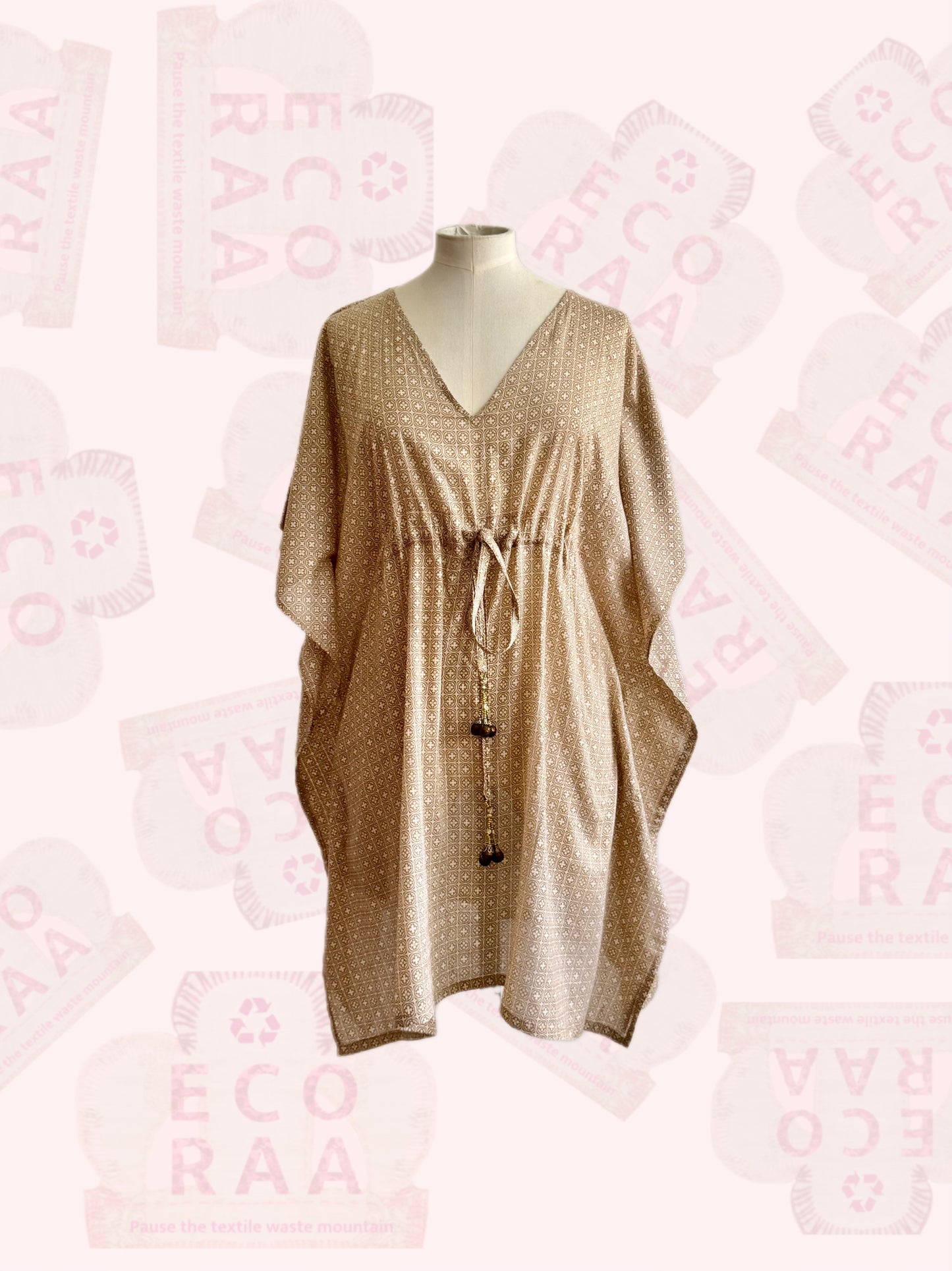 Upcycled & handmade sustainable kaftan made from discarded cotton waste.