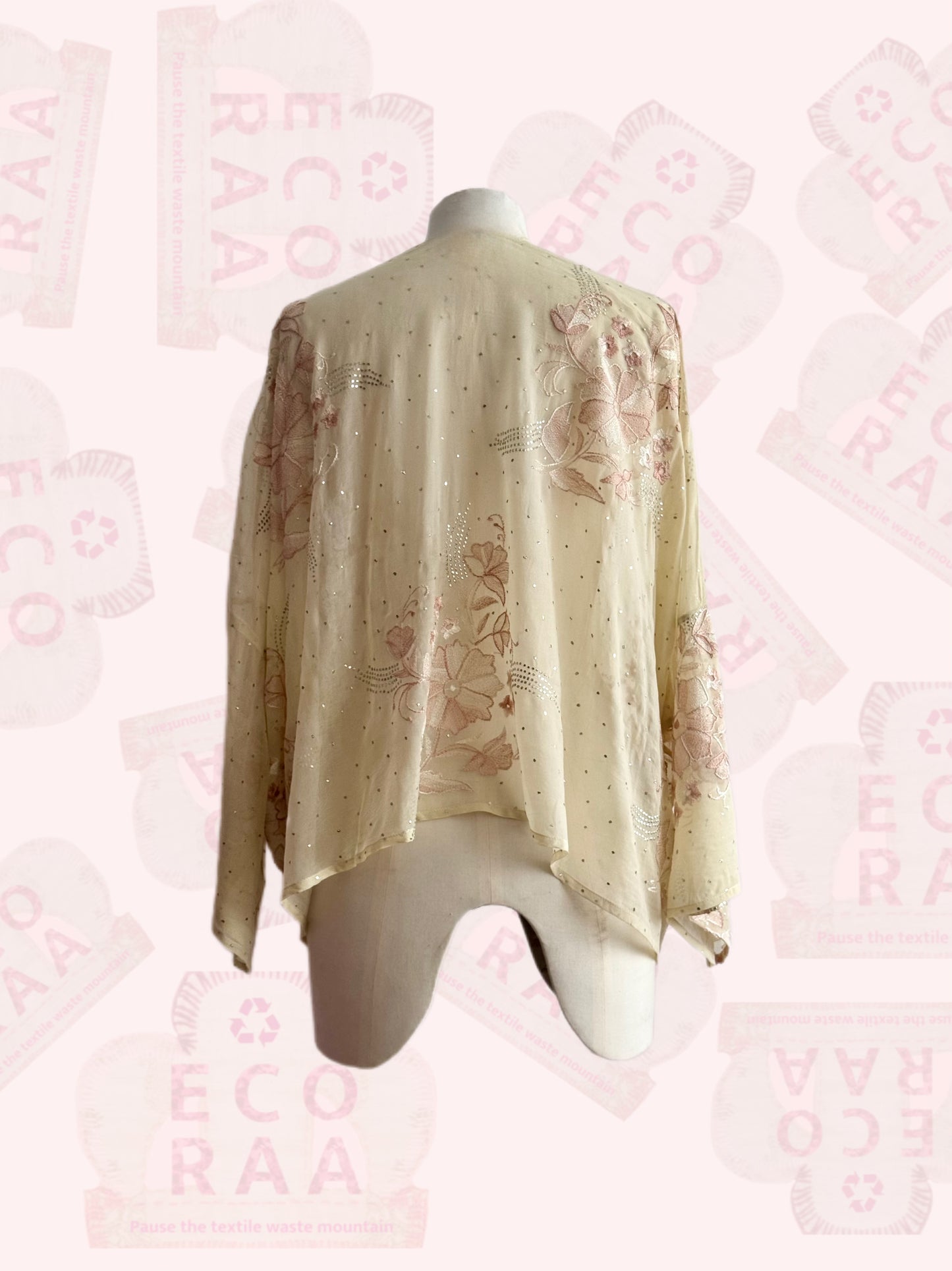 The desi jacket Upcycled & handmade from textile waste is a one size fits most easy to wear style.