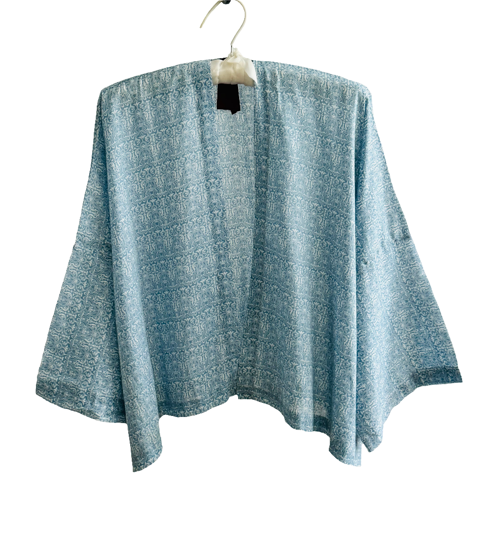 The desi jacket Upcycled & handmade from textile waste is a one size fits most easy to wear style.