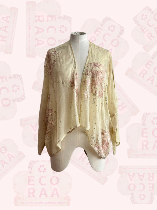 The desi jacket  Upcycled & handmade from textile waste is a one size fits most easy to wear style.